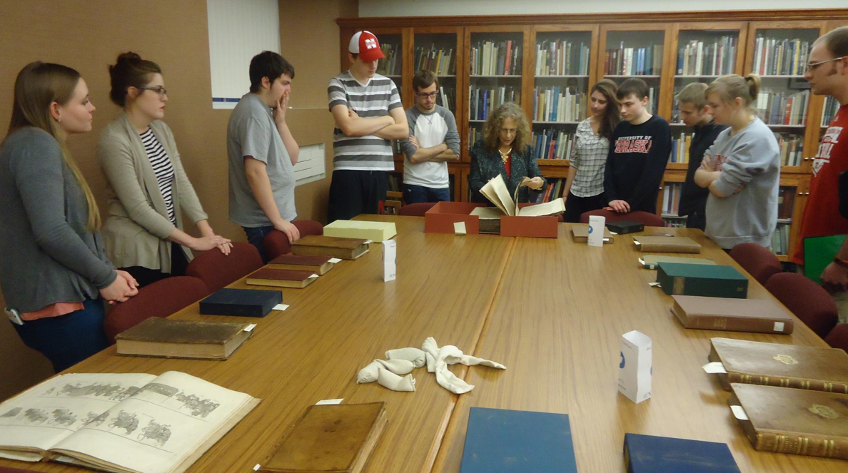 Levin and students at the library