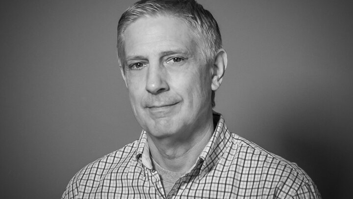 A headshot of Dr. Charles Parker